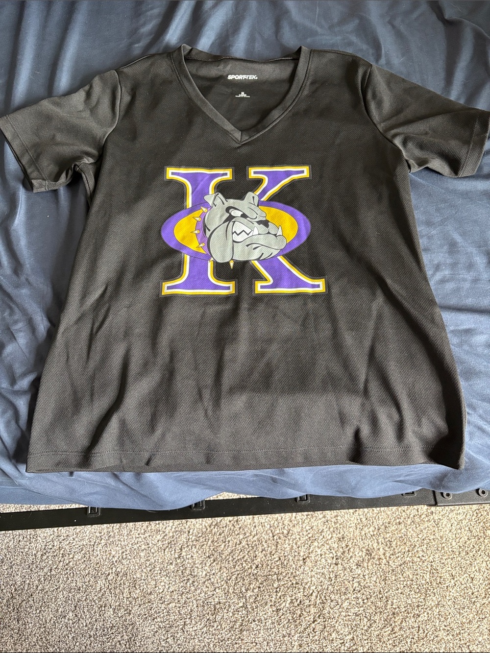 Sport-Tek Black Kids V-Neck Tee with Purple and Gold 'K' Bulldog Graphic